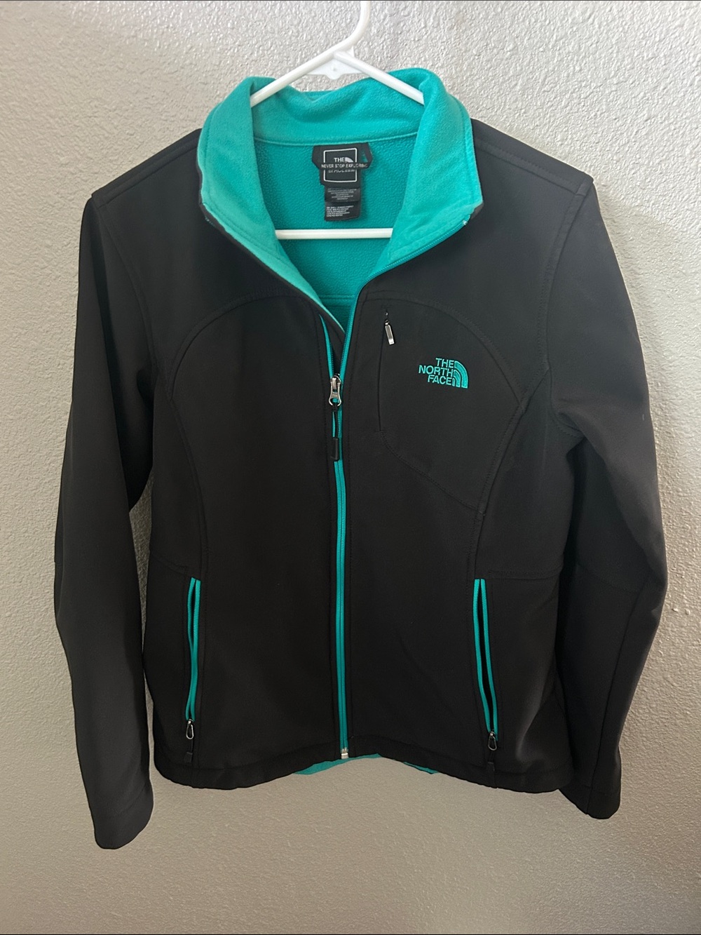 The North Face Women's Black Utility Jacket with Teal Accents